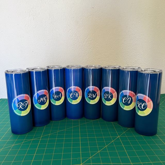 Row of printed blue tumblers